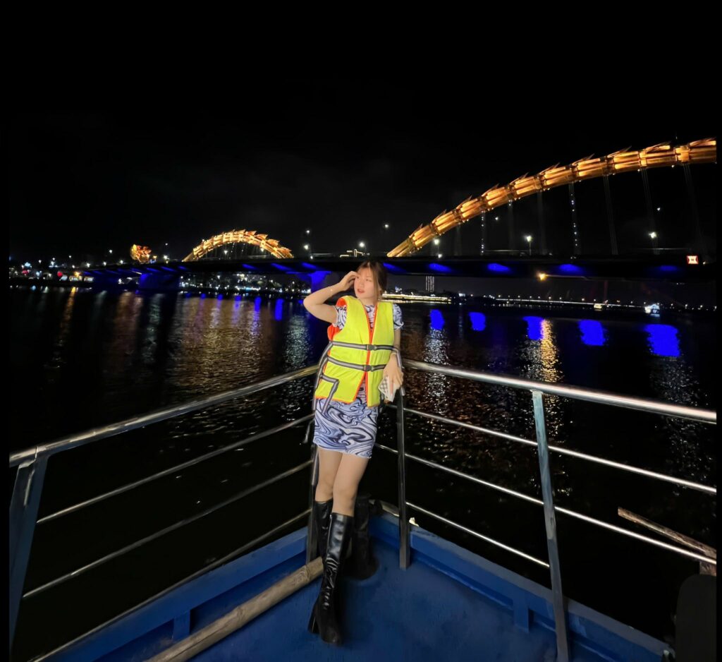 Night view on Han River with Dragon Bridge illuminated, Da Nang
