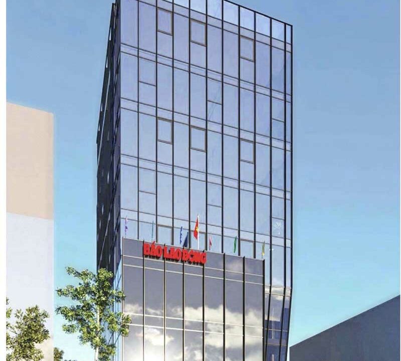 Bao Lao Dong Building office tower with modern glass facade and street-level entrance in Da Nang