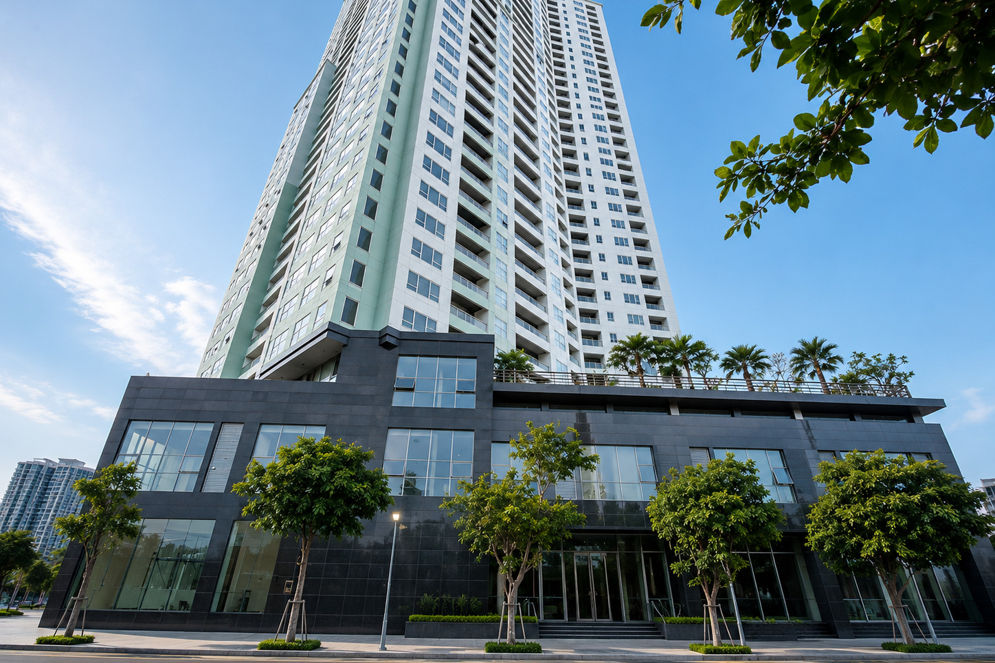 Blooming Tower Da Nang building exterior viewed from the riverside